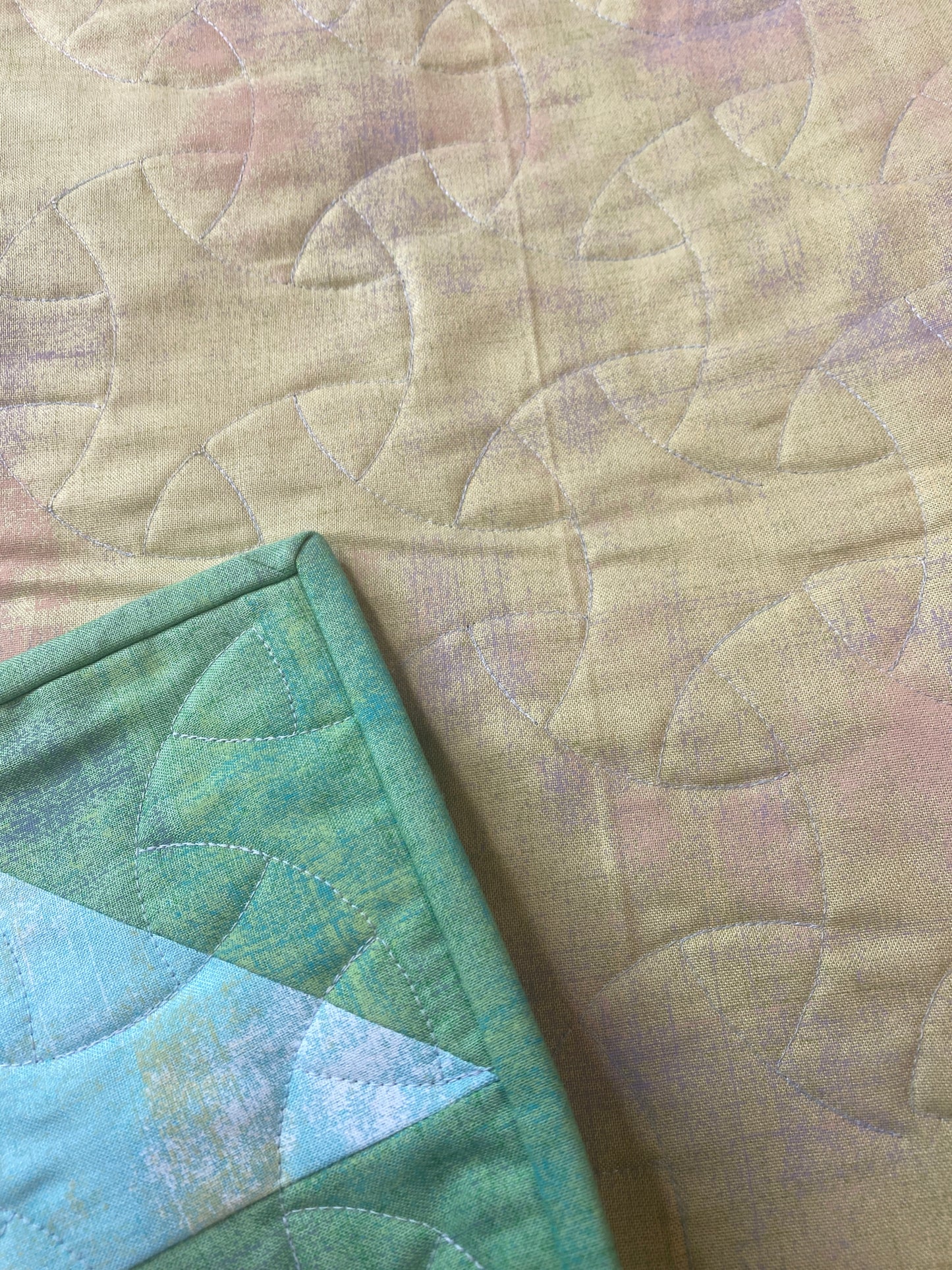 Quill handmade quilt with modern feather design in Grunge solids