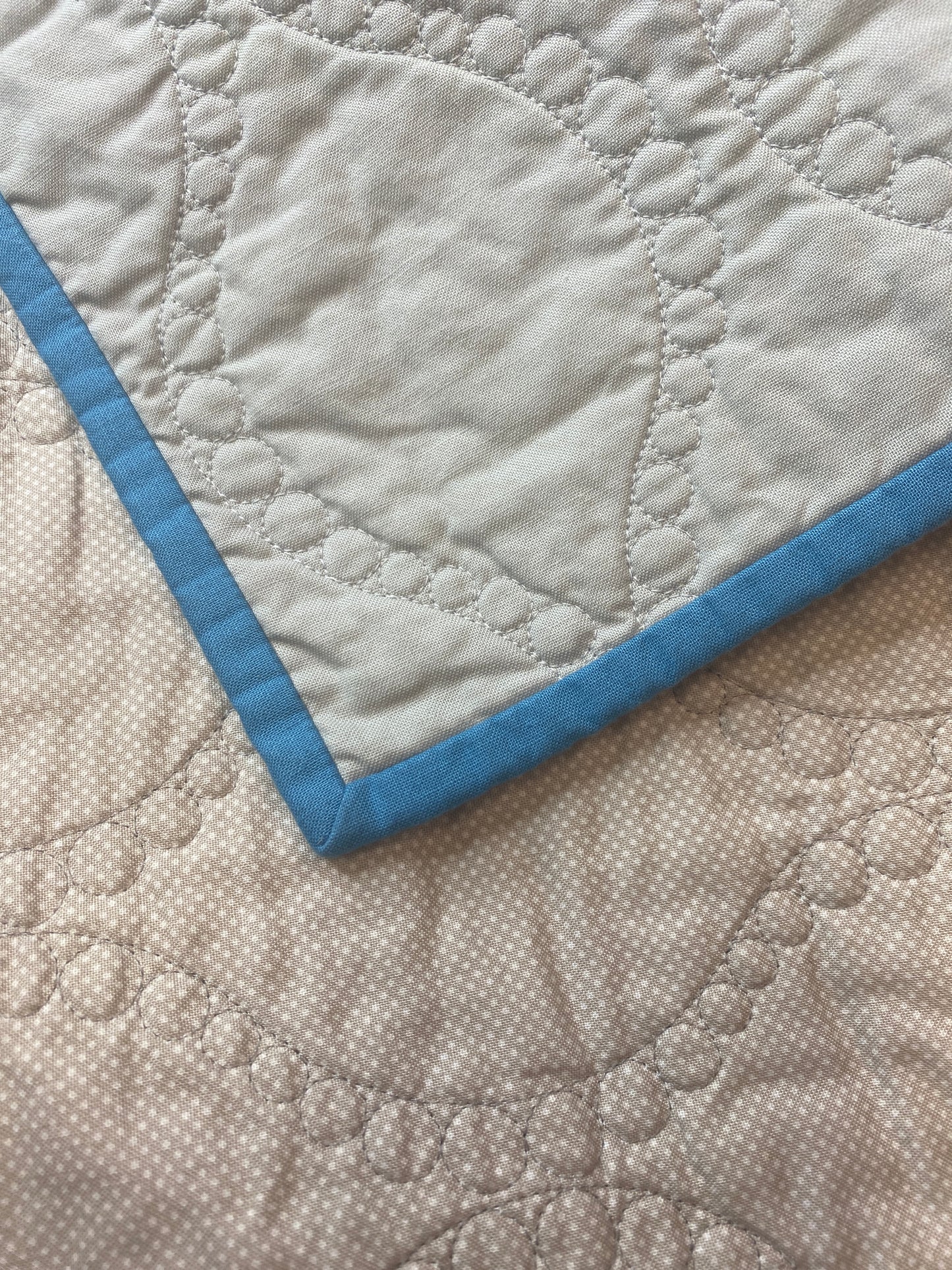Woven Stars handmade quilt – modern star pattern in blue and gray