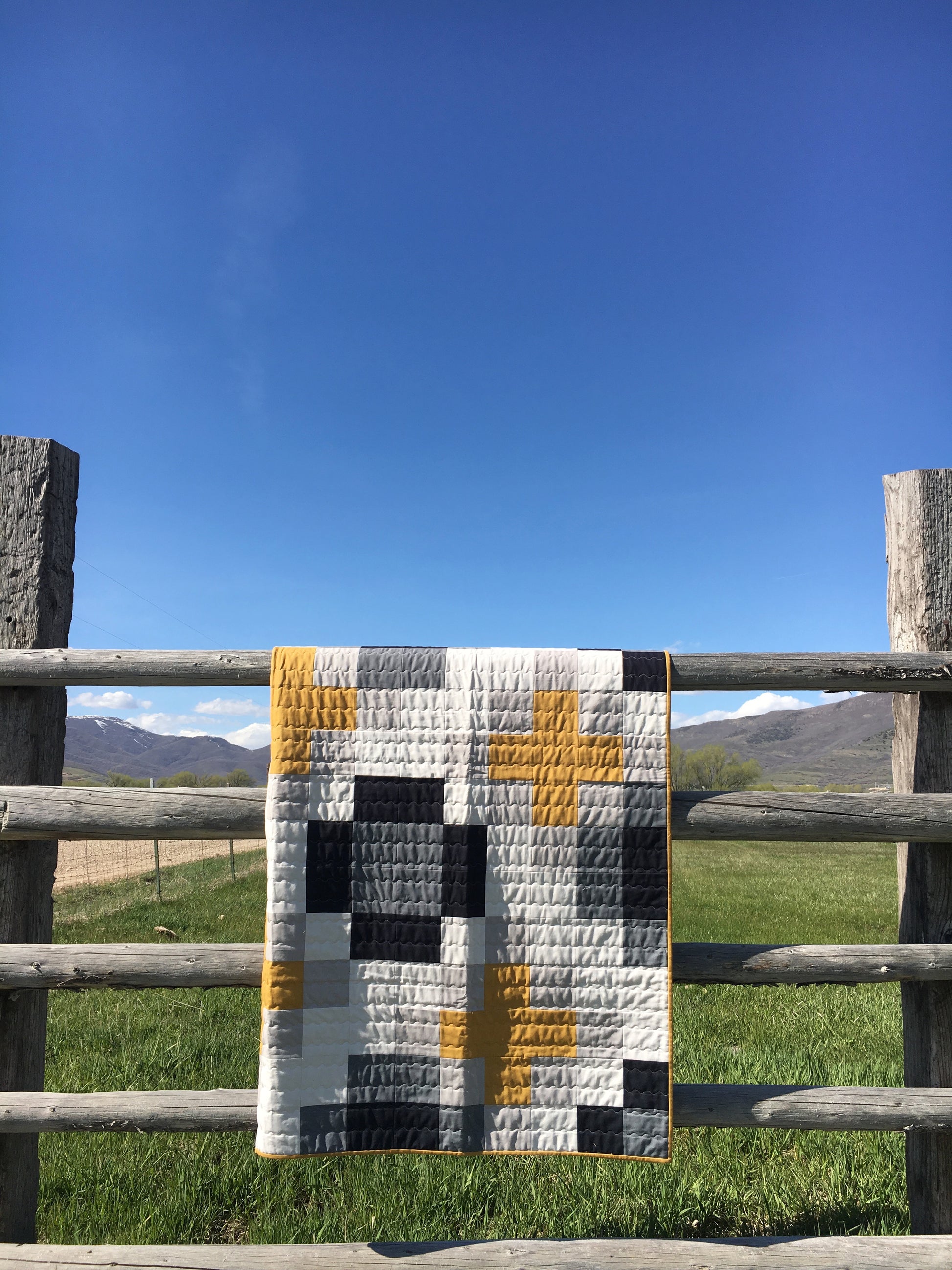Patchwork Plus Quilt showcasing geometric design with value-based fabric selection