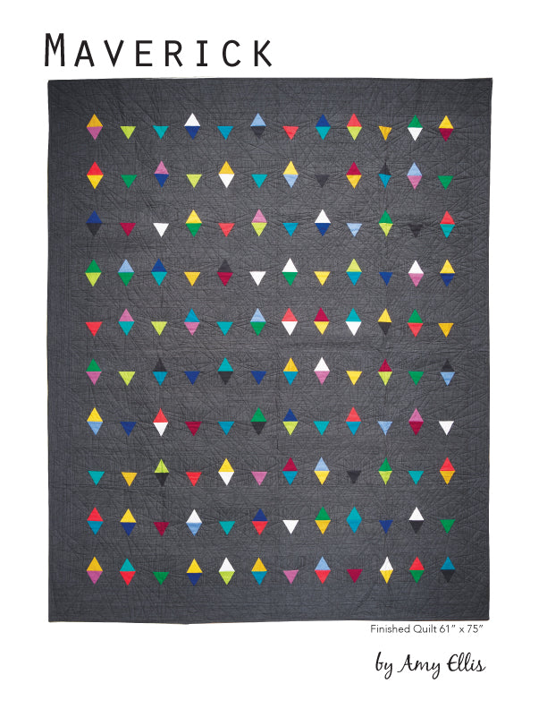 Maverick Quilt with colorful floating triangles