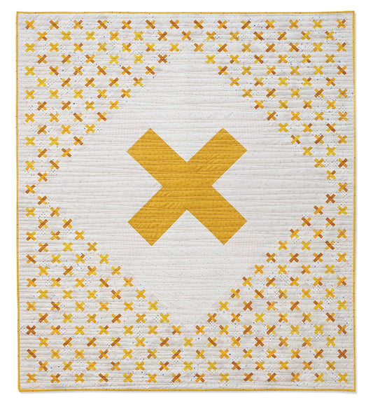 Plus One Quilt showcasing a combination of oversized and miniature blocks