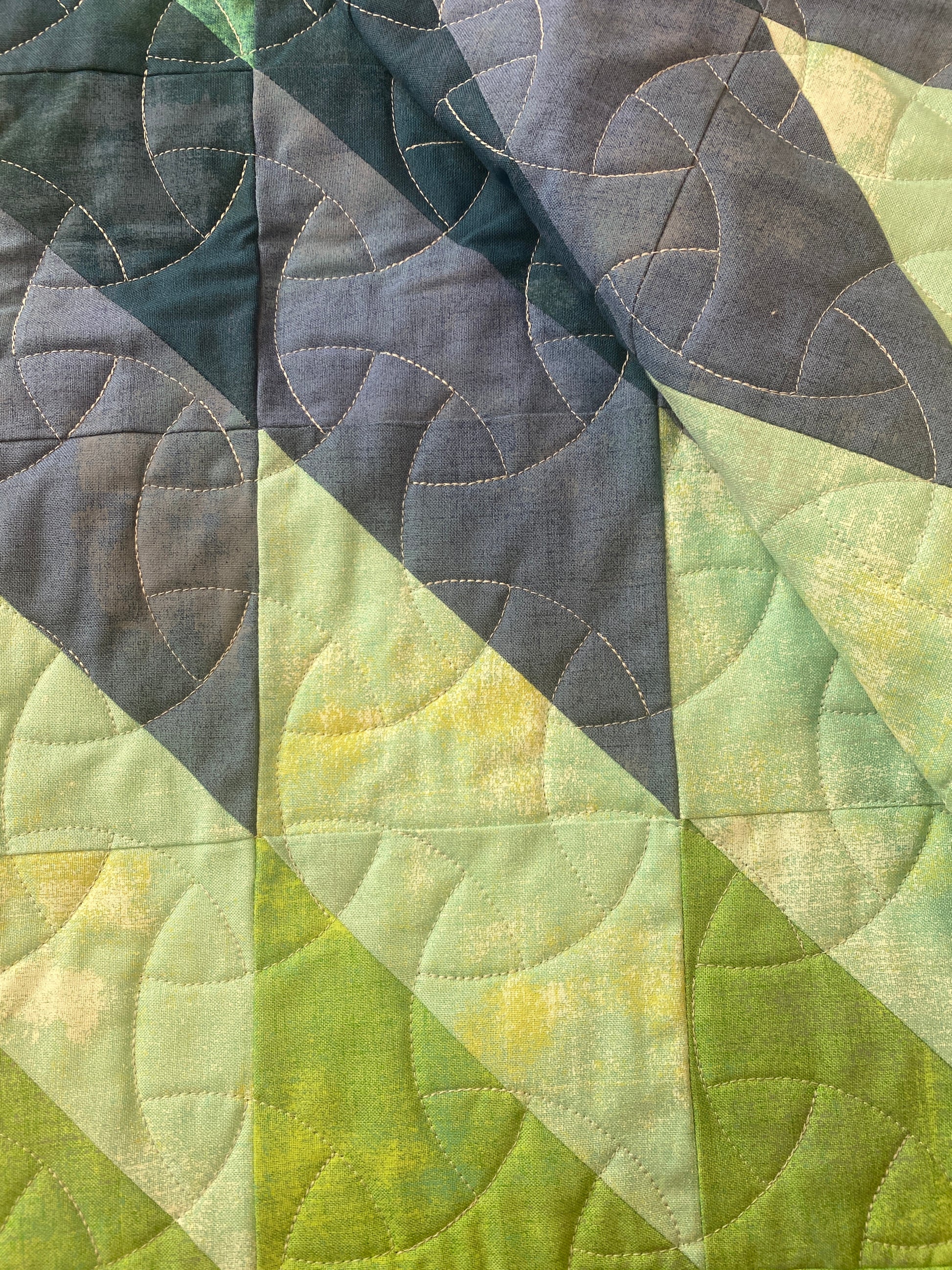 Quill handmade quilt with modern feather design in Grunge solids
