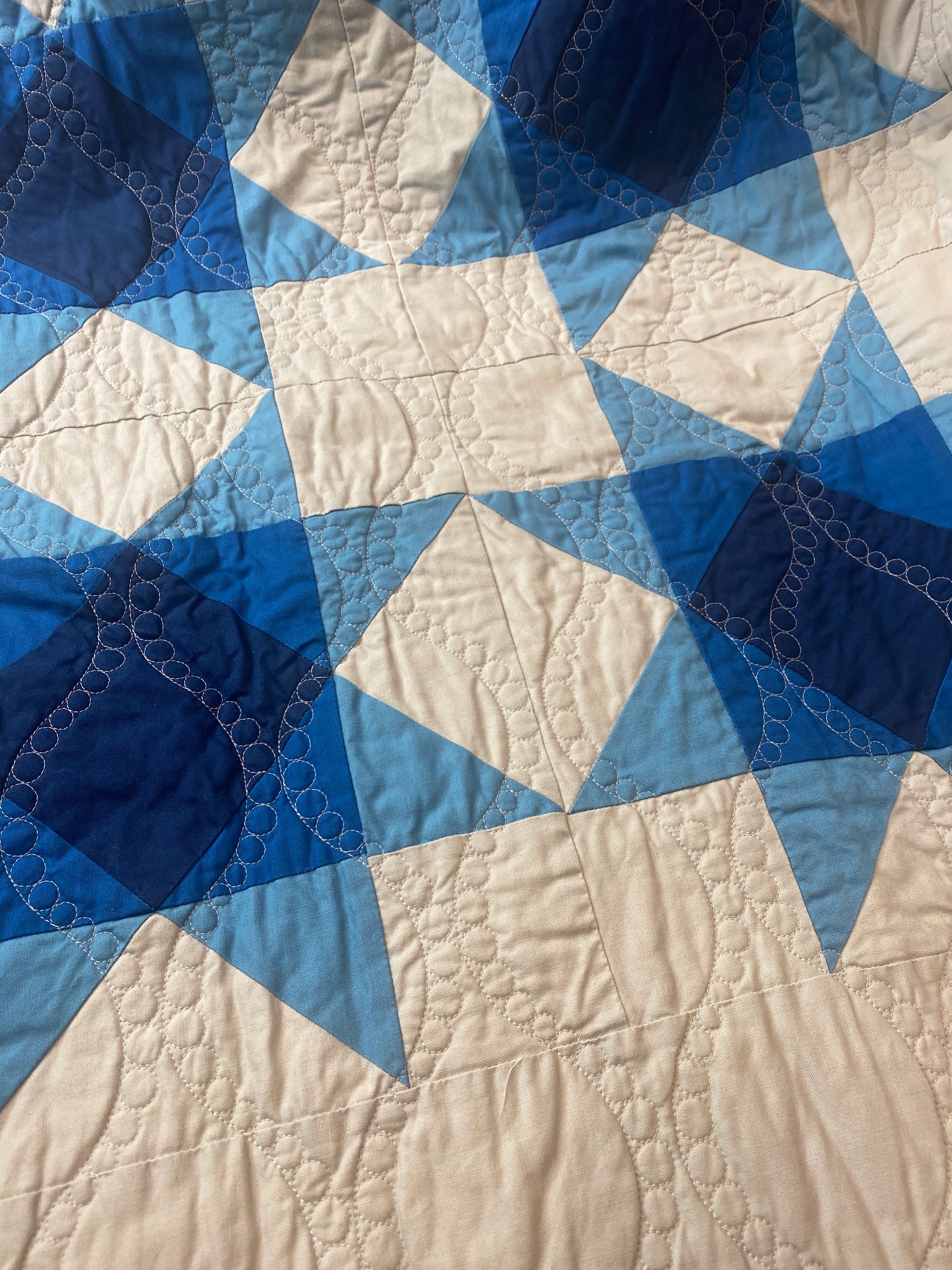 Woven Stars handmade quilt – modern star pattern in blue and gray