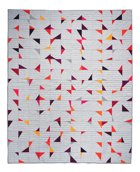Handmade quilt with modern improv triangle design – Tipsy Triangles